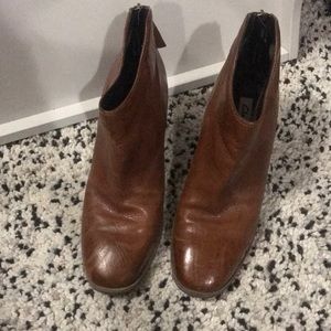 Clarks Women’s brown heeled boots.